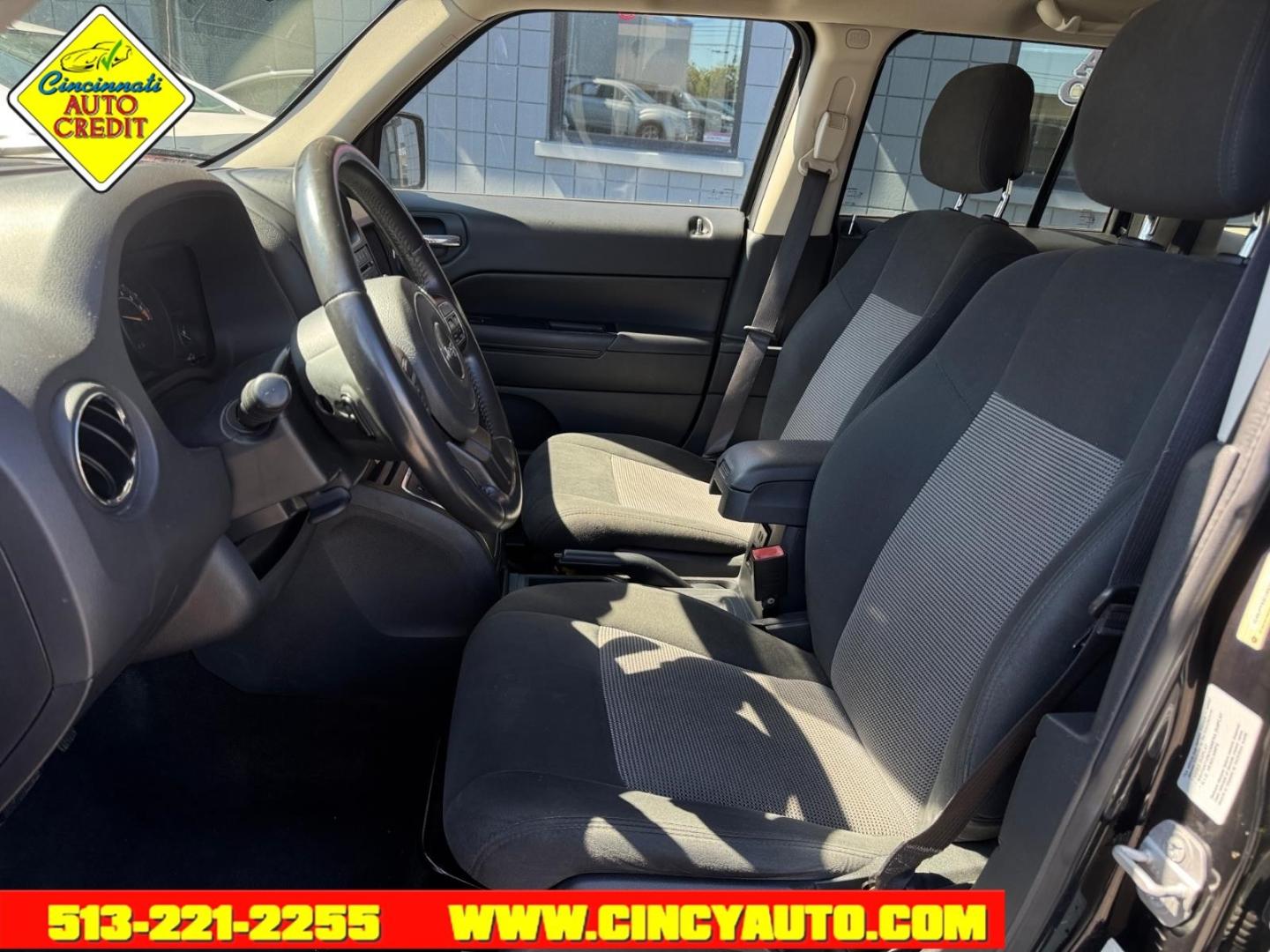 2014 Black Clear Coat Px8 Jeep Patriot Latitude (1C4NJPFB9ED) with an 2.4L 2.4L I4 172hp 165ft. lbs. Sequential Multiport Fuel Injection engine, 6-Speed Shiftable Automatic transmission, located at 2813 Gilbert Avenue, Cincinnati, OH, 45206, (513) 221-2255, 39.130219, -84.489189- Photo#5