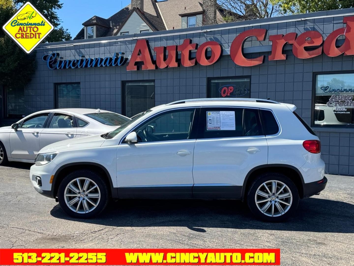 2015 Pure White 0q0q Volkswagen Tiguan SEL 4Motion (WVGBV7AX1FW) with an 2.0L 2.0L Turbo I4 200hp 207ft. lbs. Fuel Injected engine, 6-speed Automatic with Tiptronic transmission, located at 2813 Gilbert Avenue, Cincinnati, OH, 45206, (513) 221-2255, 39.130219, -84.489189- Photo#1