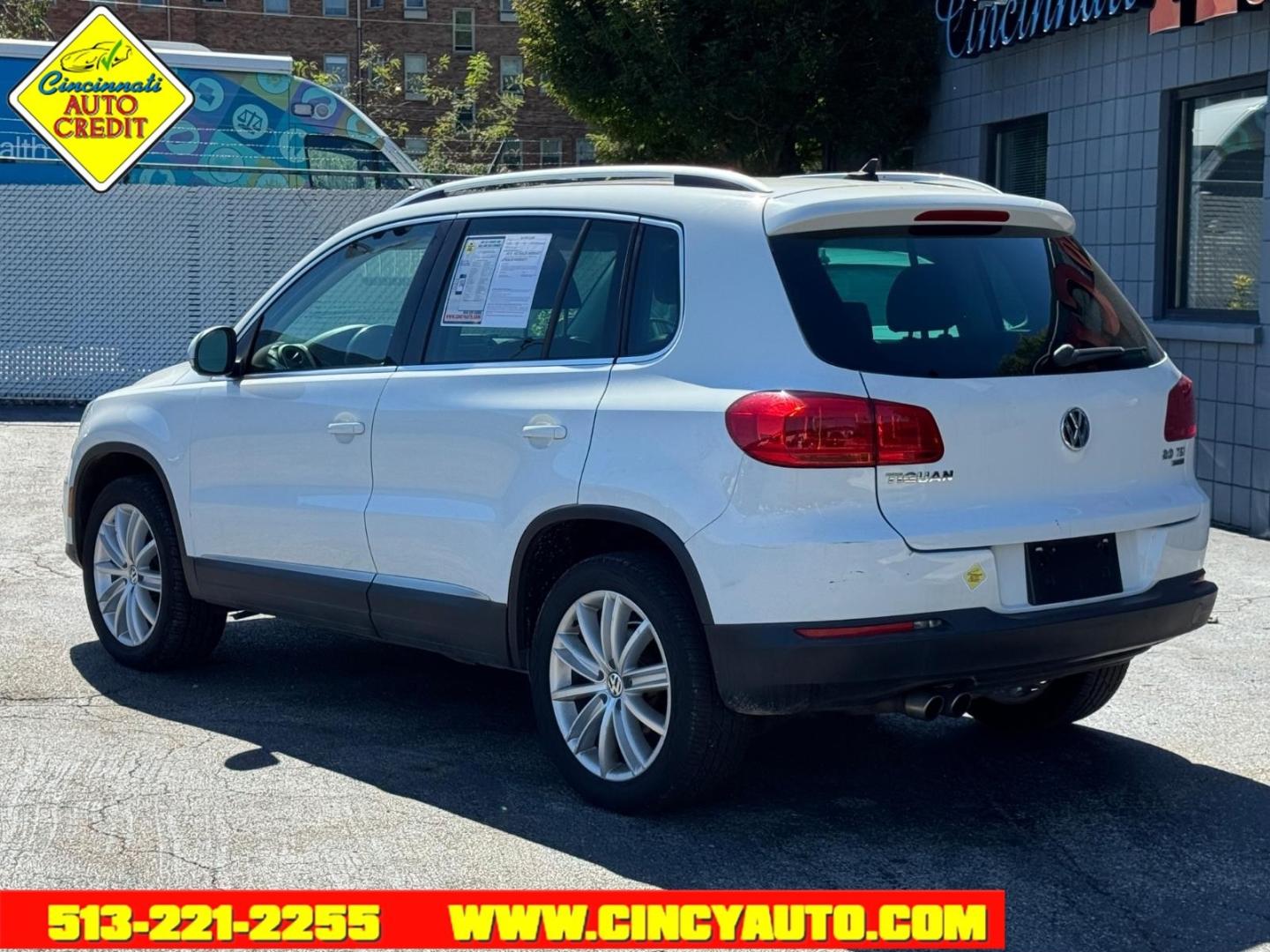2015 Pure White 0q0q Volkswagen Tiguan SEL 4Motion (WVGBV7AX1FW) with an 2.0L 2.0L Turbo I4 200hp 207ft. lbs. Fuel Injected engine, 6-speed Automatic with Tiptronic transmission, located at 2813 Gilbert Avenue, Cincinnati, OH, 45206, (513) 221-2255, 39.130219, -84.489189- Photo#2