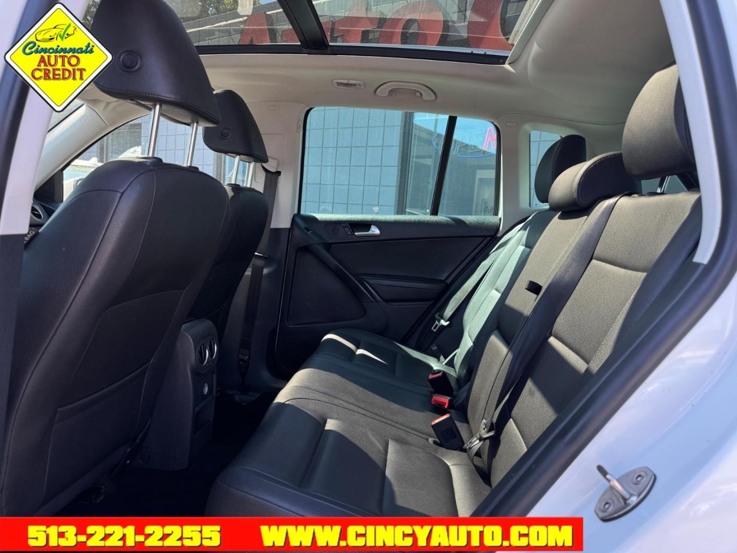 2015 Pure White 0q0q Volkswagen Tiguan SEL 4Motion (WVGBV7AX1FW) with an 2.0L 2.0L Turbo I4 200hp 207ft. lbs. Fuel Injected engine, 6-speed Automatic with Tiptronic transmission, located at 2813 Gilbert Avenue, Cincinnati, OH, 45206, (513) 221-2255, 39.130219, -84.489189- Photo#4