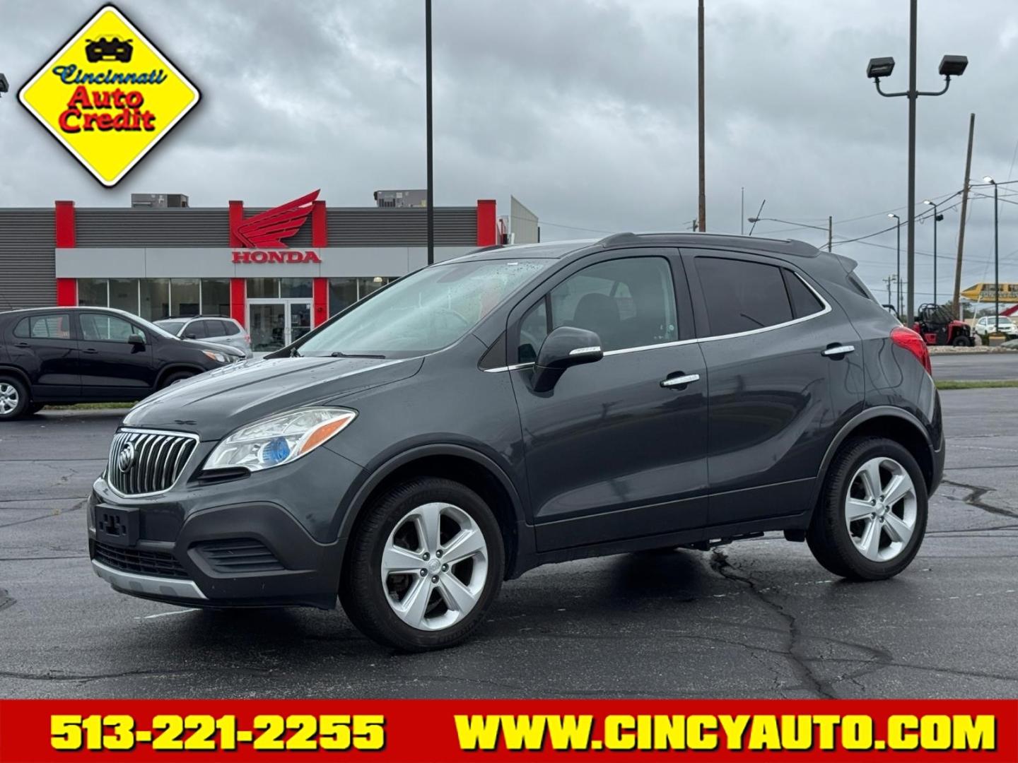 2016 Graphite Gray Metallic/Dark Cocoa Ash Gk2/Bqu Buick Encore Base (KL4CJESB0GB) with an 1.4L Ecotec 1.4L Turbo I4 138hp 148ft. lbs. Sequential Multiport Fuel Injection engine, 6-Speed Automatic w/Driver Shift Control transmission, located at 5489 Dixie Highway, Fairfield, OH, 45014, (513) 221-2255, 39.333084, -84.523834- Photo#0