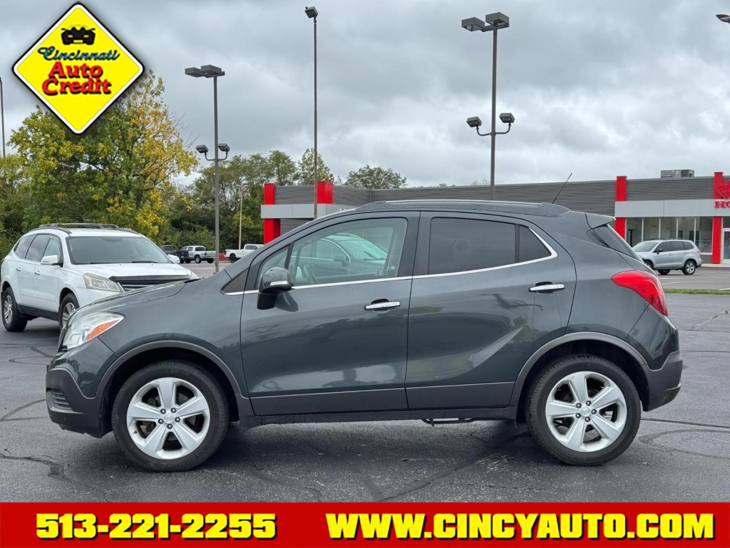 2016 Graphite Gray Metallic/Dark Cocoa Ash Gk2/Bqu Buick Encore Base (KL4CJESB0GB) with an 1.4L Ecotec 1.4L Turbo I4 138hp 148ft. lbs. Sequential Multiport Fuel Injection engine, 6-Speed Automatic w/Driver Shift Control transmission, located at 5489 Dixie Highway, Fairfield, OH, 45014, (513) 221-2255, 39.333084, -84.523834- Photo#1