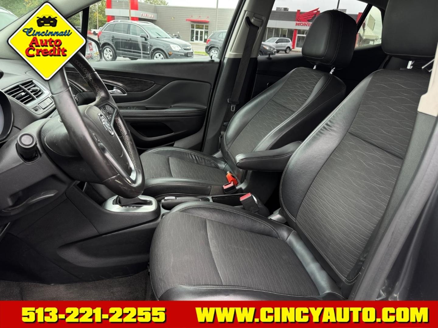 2016 Graphite Gray Metallic/Dark Cocoa Ash Gk2/Bqu Buick Encore Base (KL4CJESB0GB) with an 1.4L Ecotec 1.4L Turbo I4 138hp 148ft. lbs. Sequential Multiport Fuel Injection engine, 6-Speed Automatic w/Driver Shift Control transmission, located at 5489 Dixie Highway, Fairfield, OH, 45014, (513) 221-2255, 39.333084, -84.523834- Photo#5